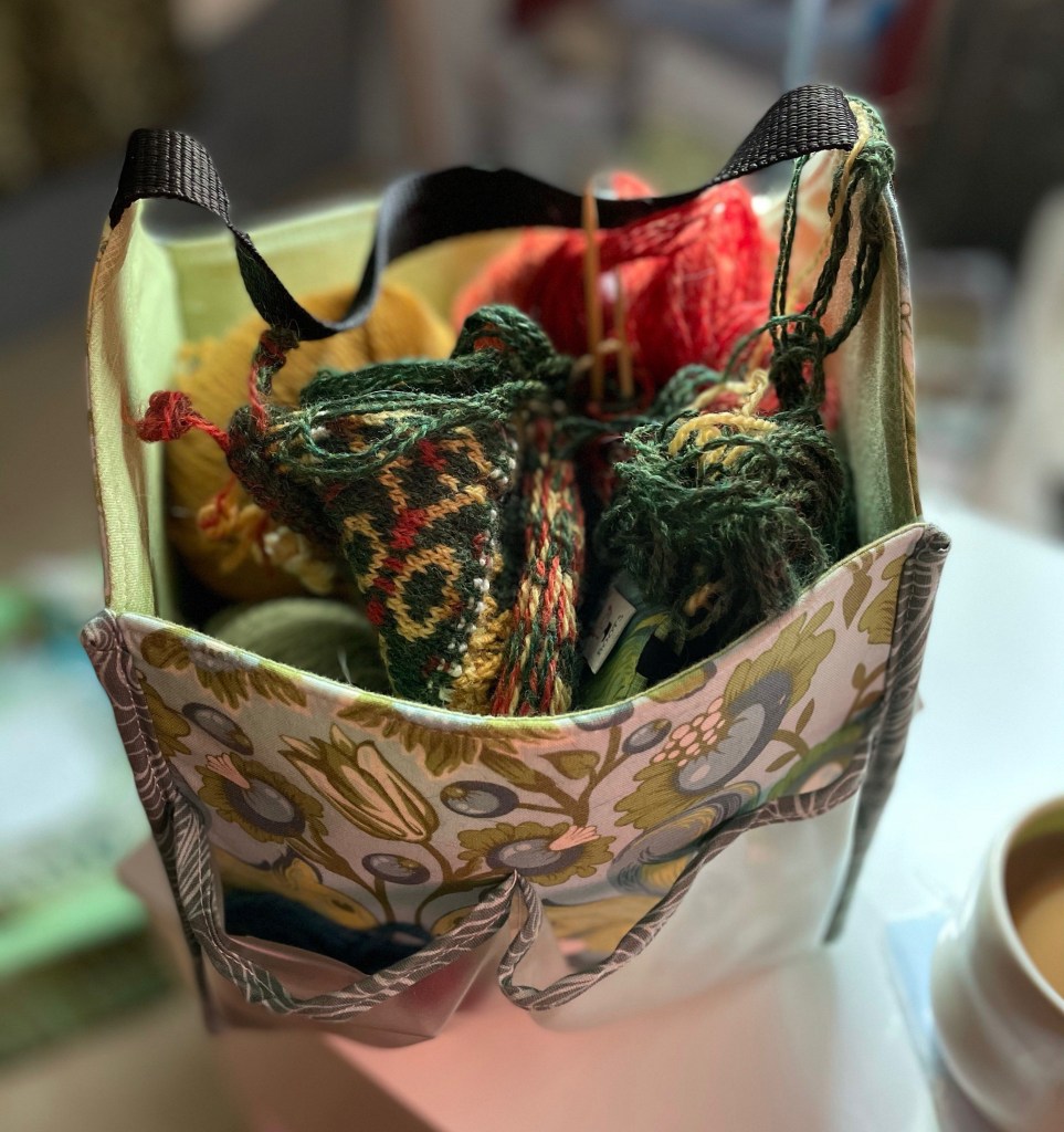 Mishmash of yarn and knitting in a bag.