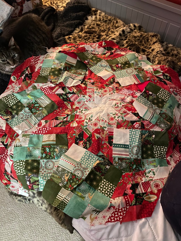 A partially assembled tree skirt.